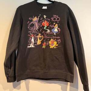 Port and Company Black Disney 100 Years Music & Wonder Graphic Sweatshirt